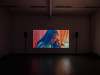 <p>Installationsansicht, <em>Home from Home,</em> Filmstill aus Sejad Ademaj: 15 Minuten, 2022, 13 Min. Foto: Fred Dott.</p>